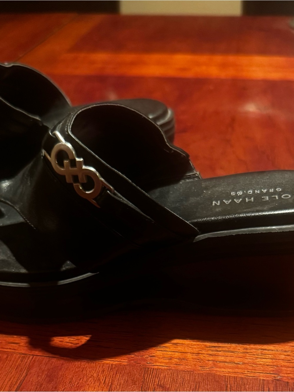 Cole Haan Grand.OS Black Leather Wedge Thong Sandals Size 5B
With Silver Logo